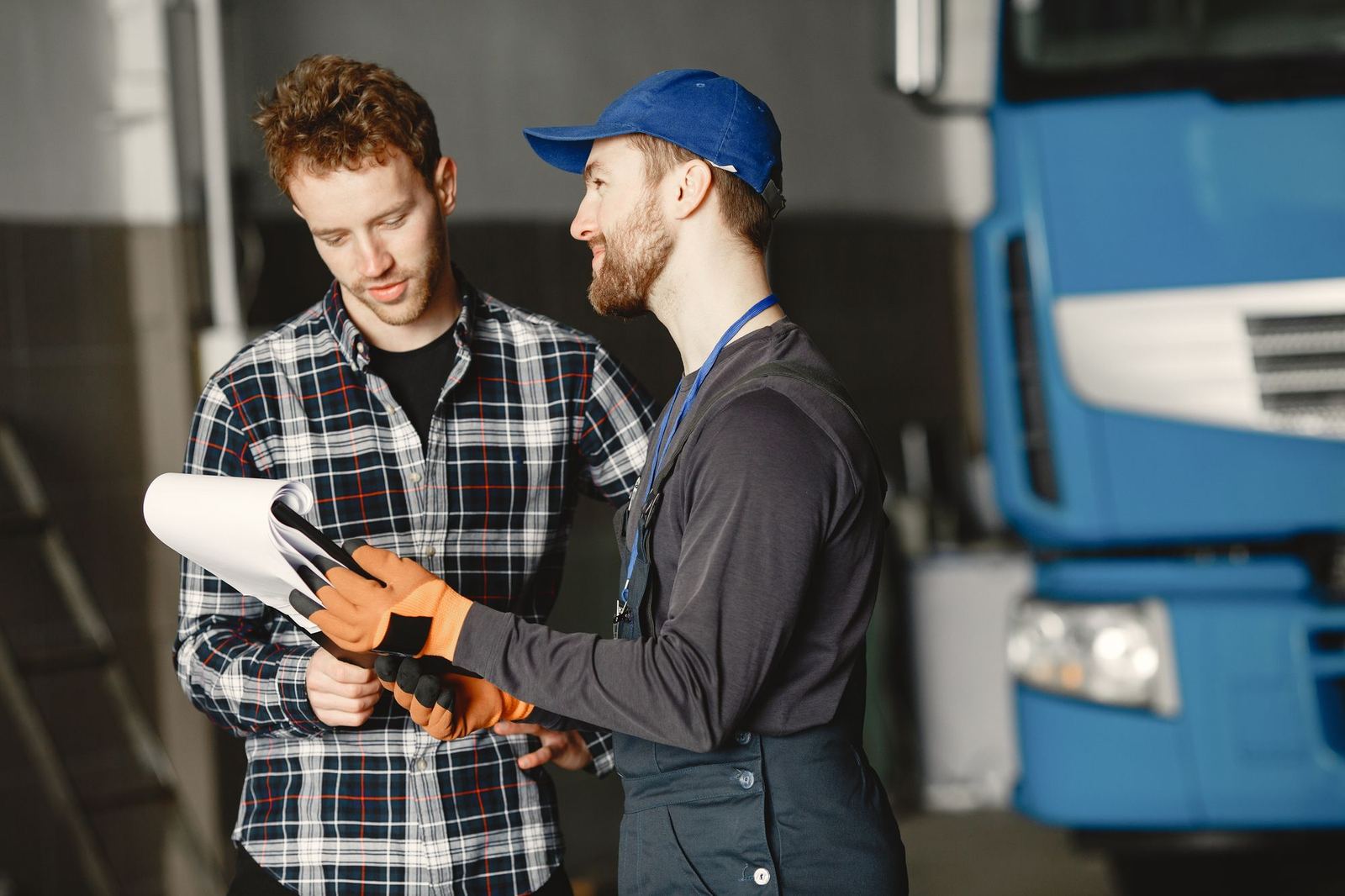 A service advisor walking a customer through the work on their vehicle