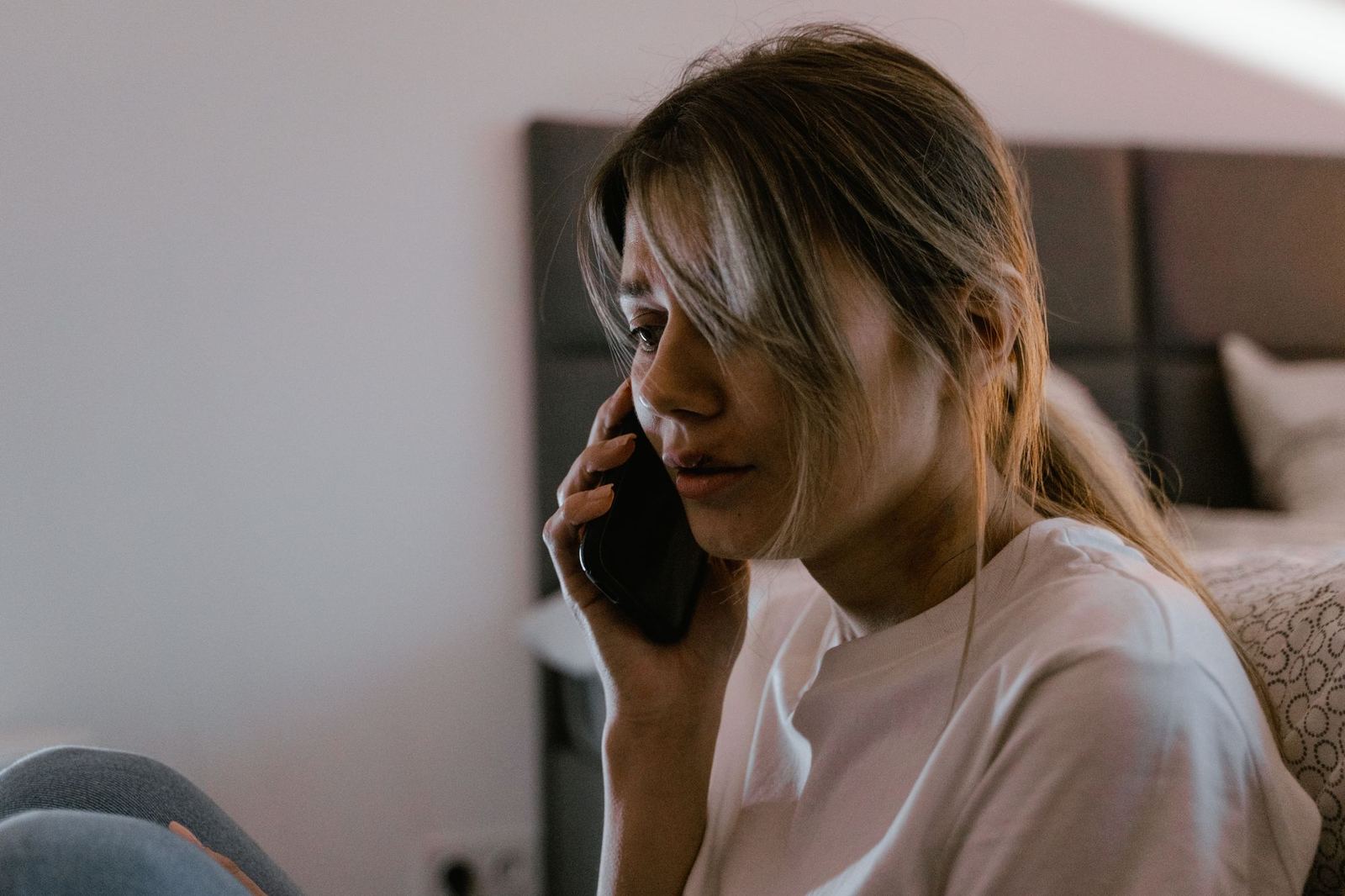 A customer on a phone call, waiting for an answer